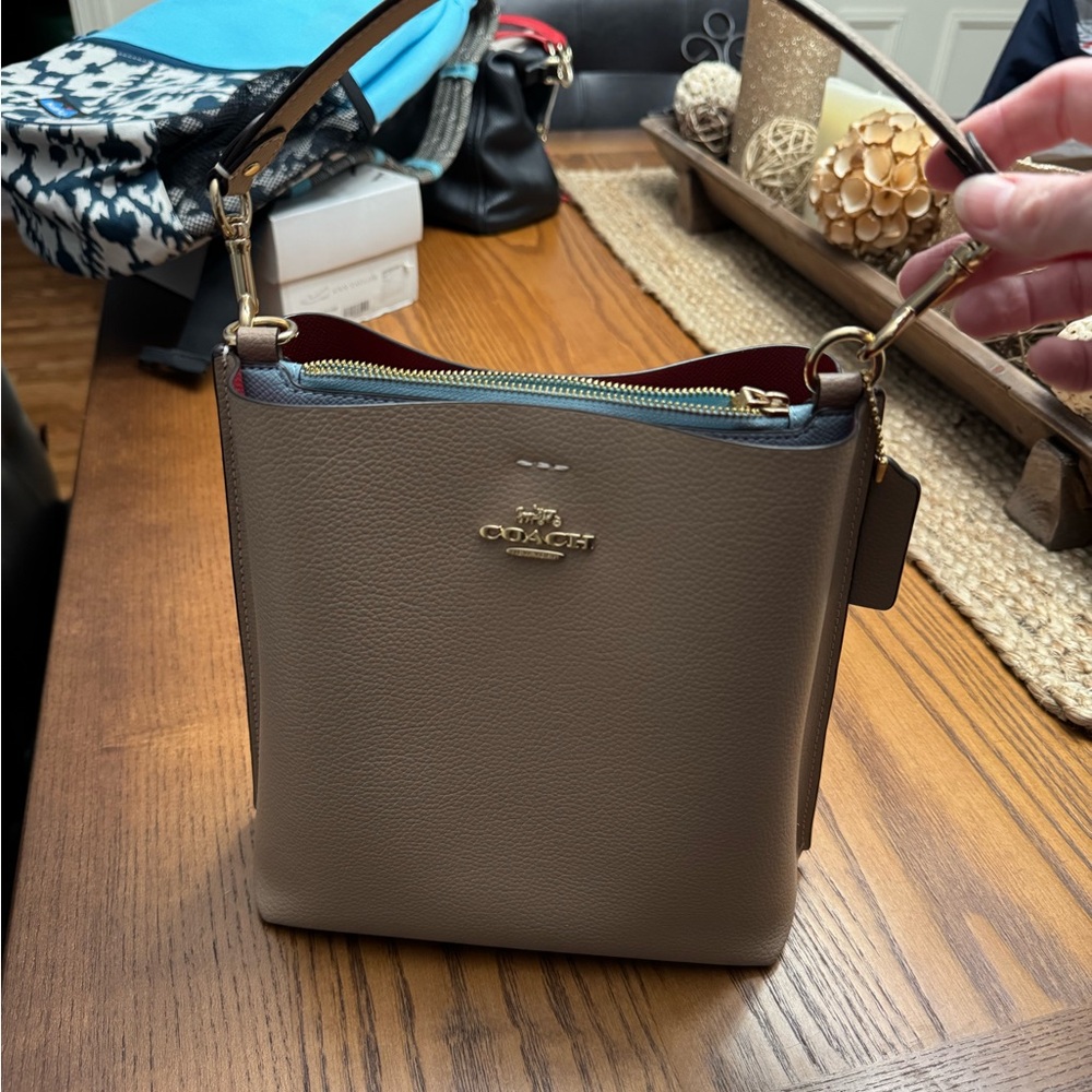Coach Mollie Bucket Bag 22 - tan pebbled leather.